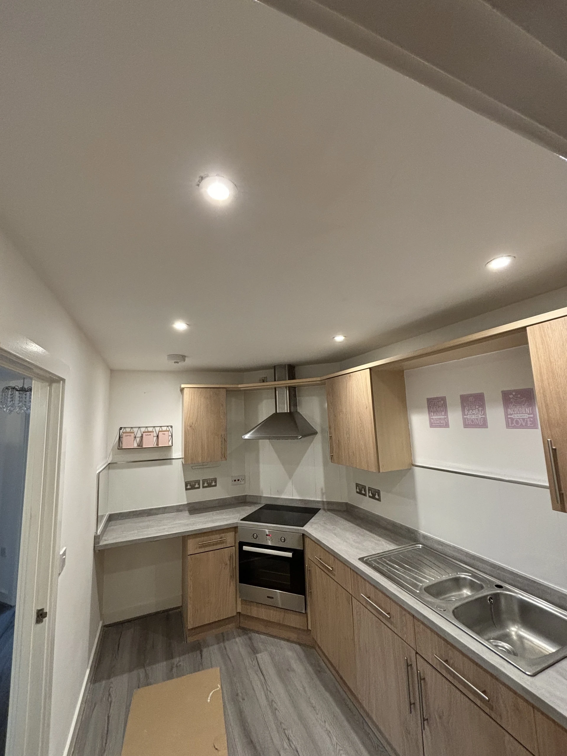 Kitchen ceiling lighting and worktop electrical sockets